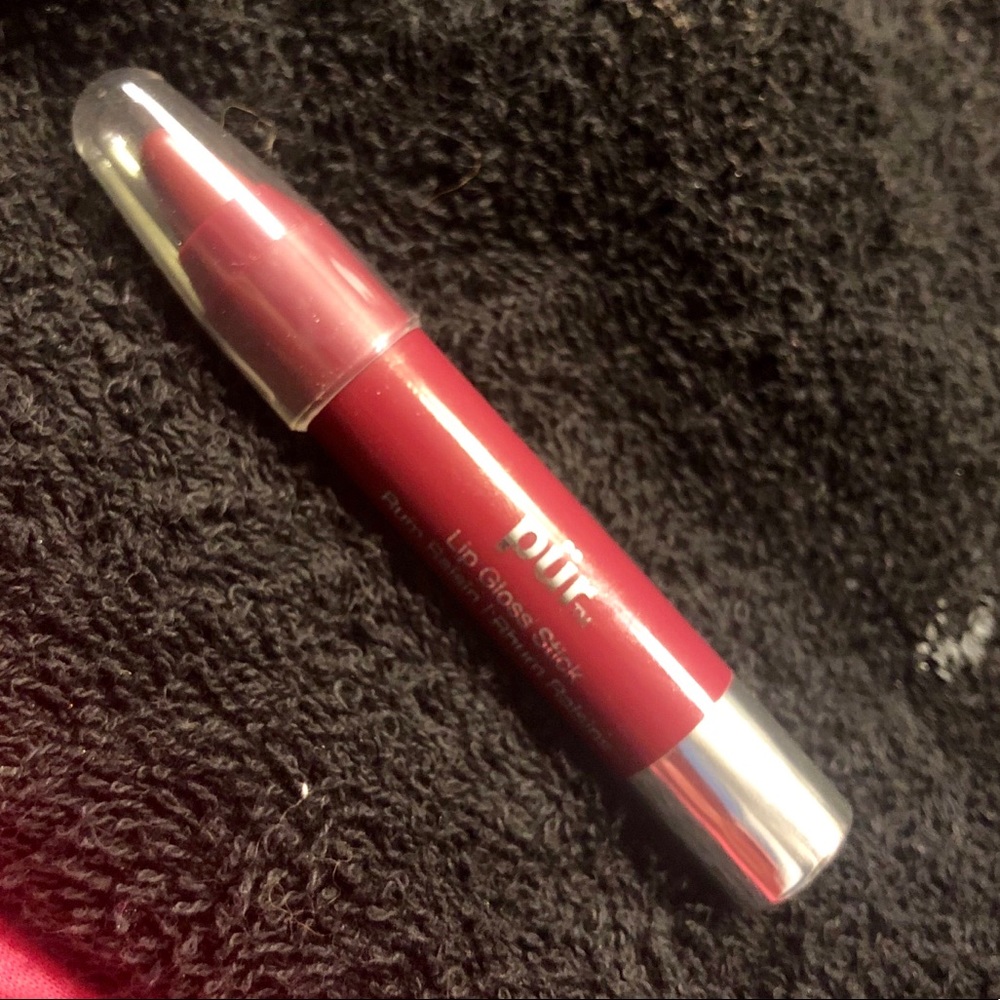 Pur cosmetics lipgloss stick in Rum Raisins. New